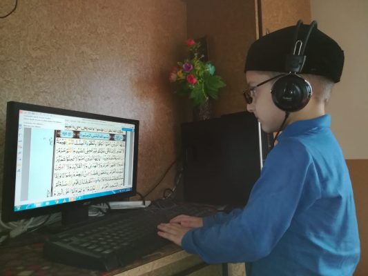 Child Learning Quran